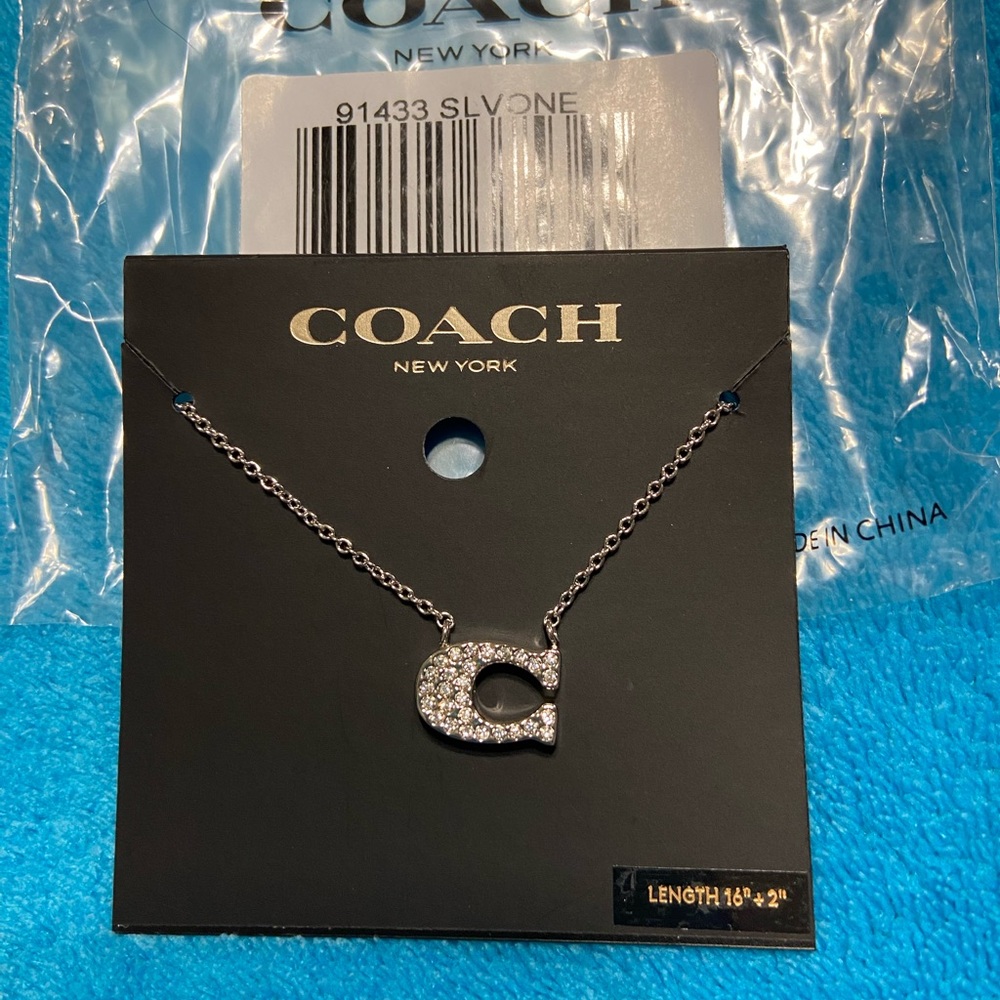 Coach brand new jewelry set. Necklace, earring and bracelet set. - Picture 7 of 11